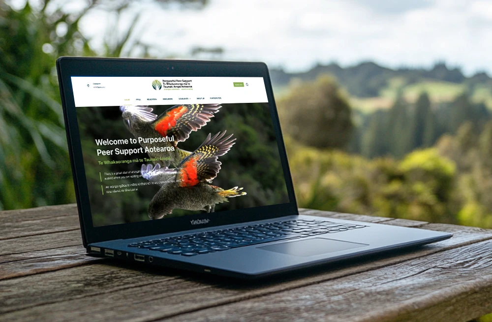 Responsive, Tauranga digital design agency. Client project  - Purposeful Peer Support, Website development, web hosting, Purposeful Peer Support - homepage on a laptop