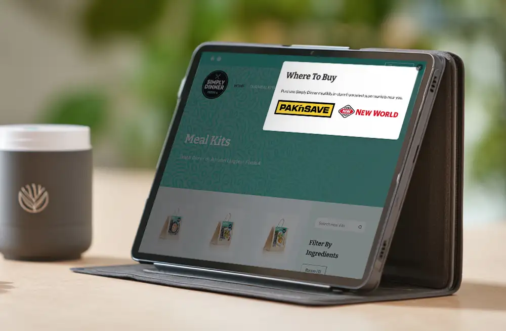 Responsive, Tauranga digital design agency. Client project - Simply Dinner, Website development, web hosting, Simply Dinner - where to buy popup on a laptop