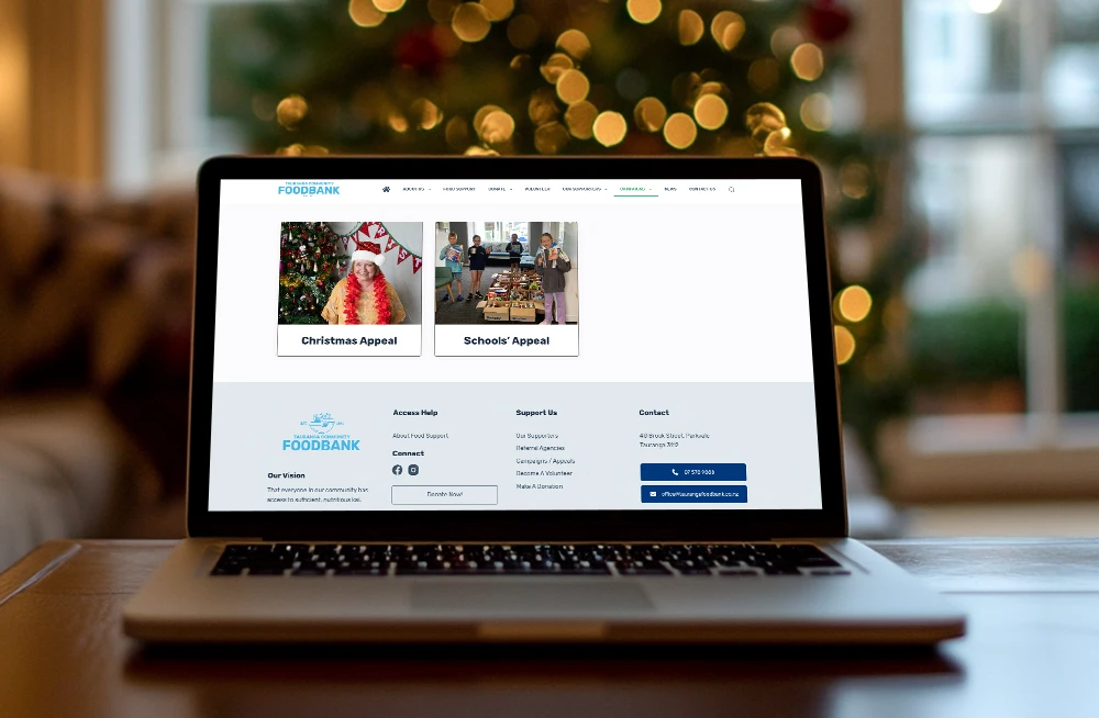 Responsive, Tauranga digital design agency. Client project  - Tauranga Community Foodbank, Website development, web hosting, Tauranga Community Foodbank - campaigns page on a laptop